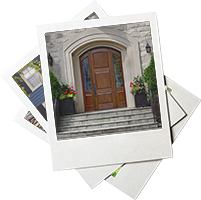 a stack of printed photos showing fronts of homes